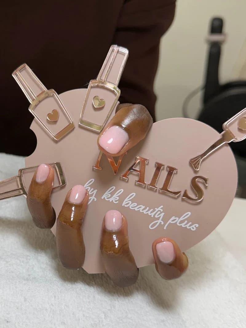 Baby pink gel with white French tips on short nails