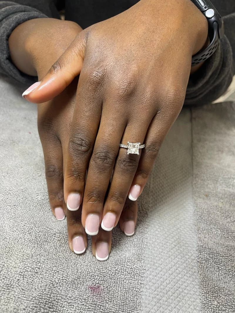 Classic French manicure on short natural nails
