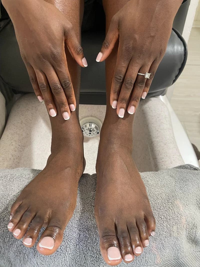 Matching French manicure and pedicure at the pedicure spa chair